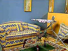 The House of Aboriginality&rsquo;s lounge room &ndash; 100% furnished with pseudo-Aboriginal goods.